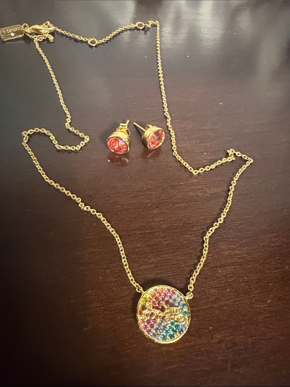 Coach Gold-Tone Multicolor Crystal Disc Necklace with Pink Studs